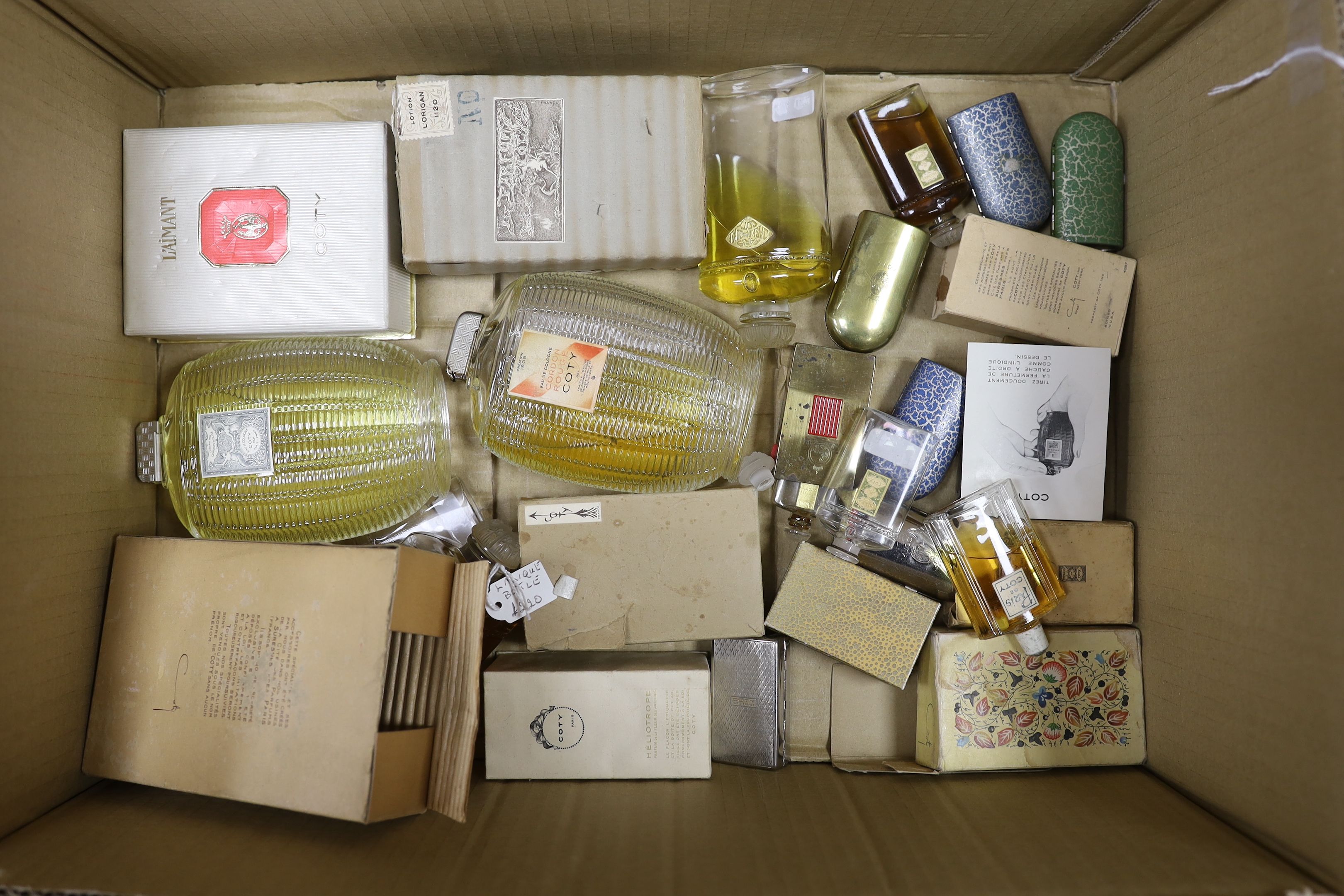 A collection of vintage and later Coty perfume bottles, including ‘Corday Rouge’ and a collection of miniature cased examples, approximately 23